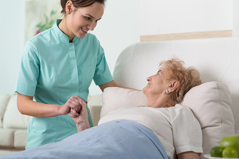 Woman in hospital bed 